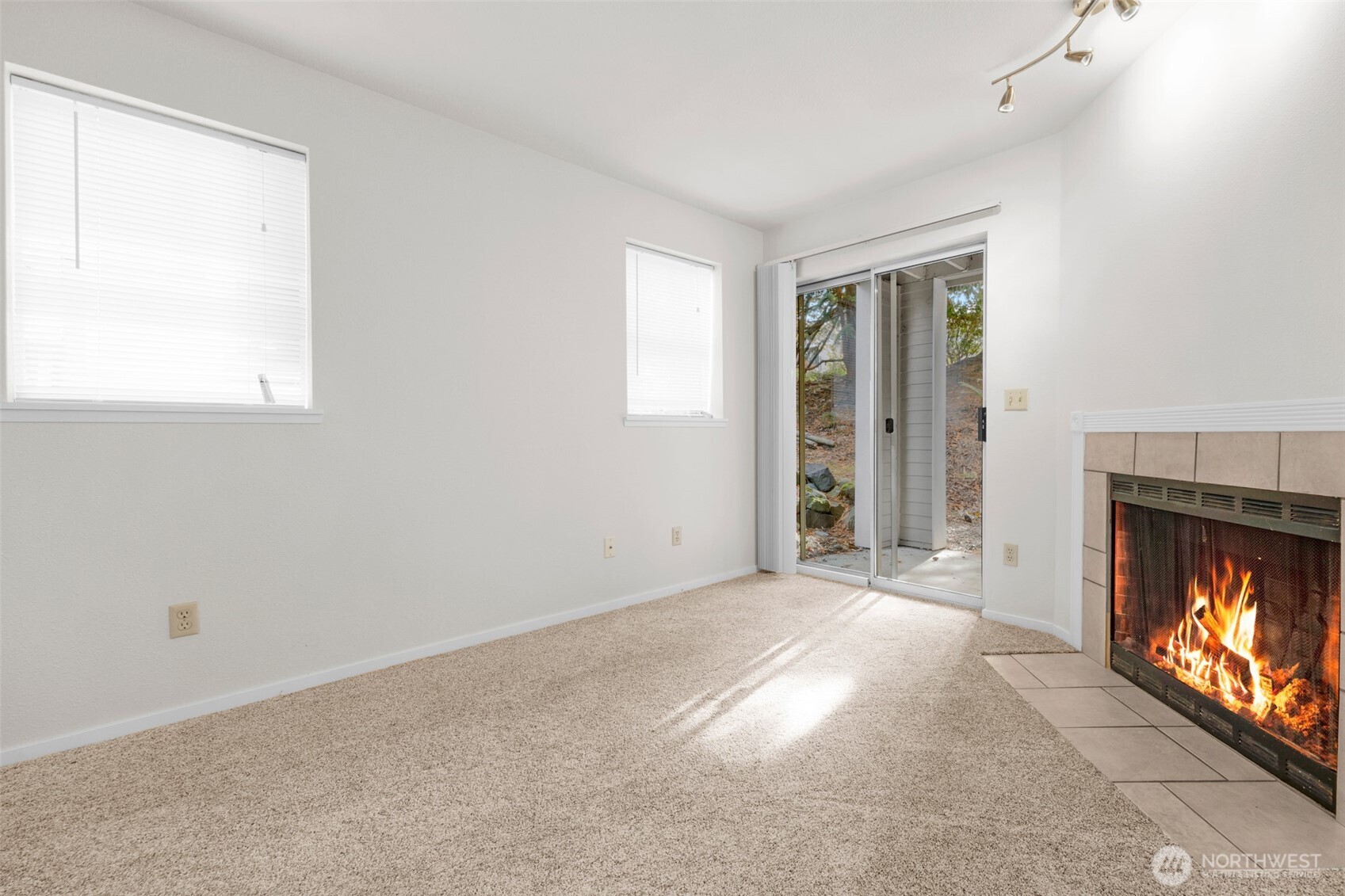 5300 Harbour Pointe Boulevard, Unit 307A Mukilteo, WA 98275 - Photo 7 of 25 a view of an empty room with window and fire place