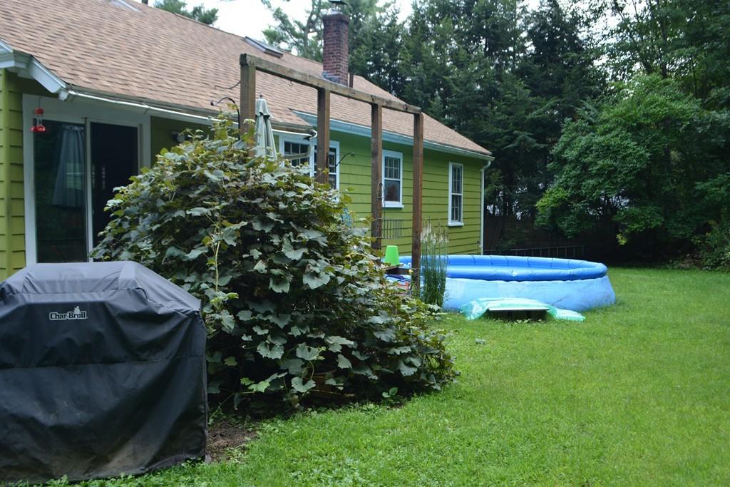 380 Worcester Road Barre, MA 01005 - Photo 3 of 42 a view of a house with a backyard and garden