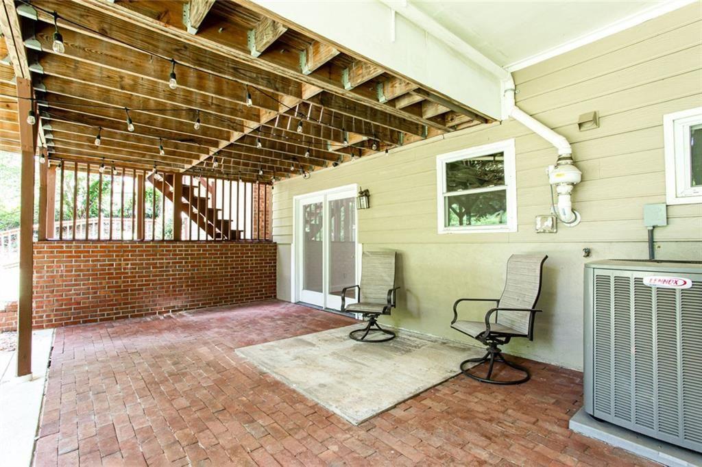 2814 Goodfellows Road Tucker, GA 30084 - Photo 39 of 46 a view of a chairs and table in a patio