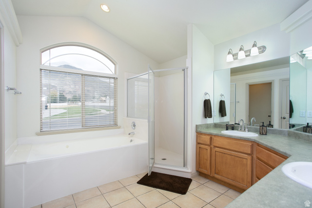 426 Deer Hollow Road Tooele, UT 84074 - Photo 14 of 37 Bathroom featuring double vanity, a bath, light tile patterned flooring, a shower stall, and recessed lighting