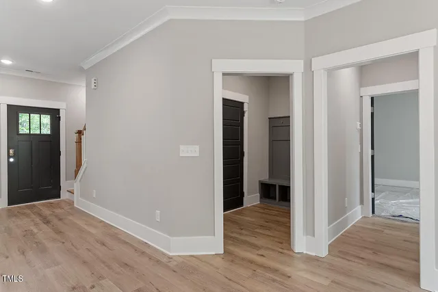 a view of entryway with wooden floor
