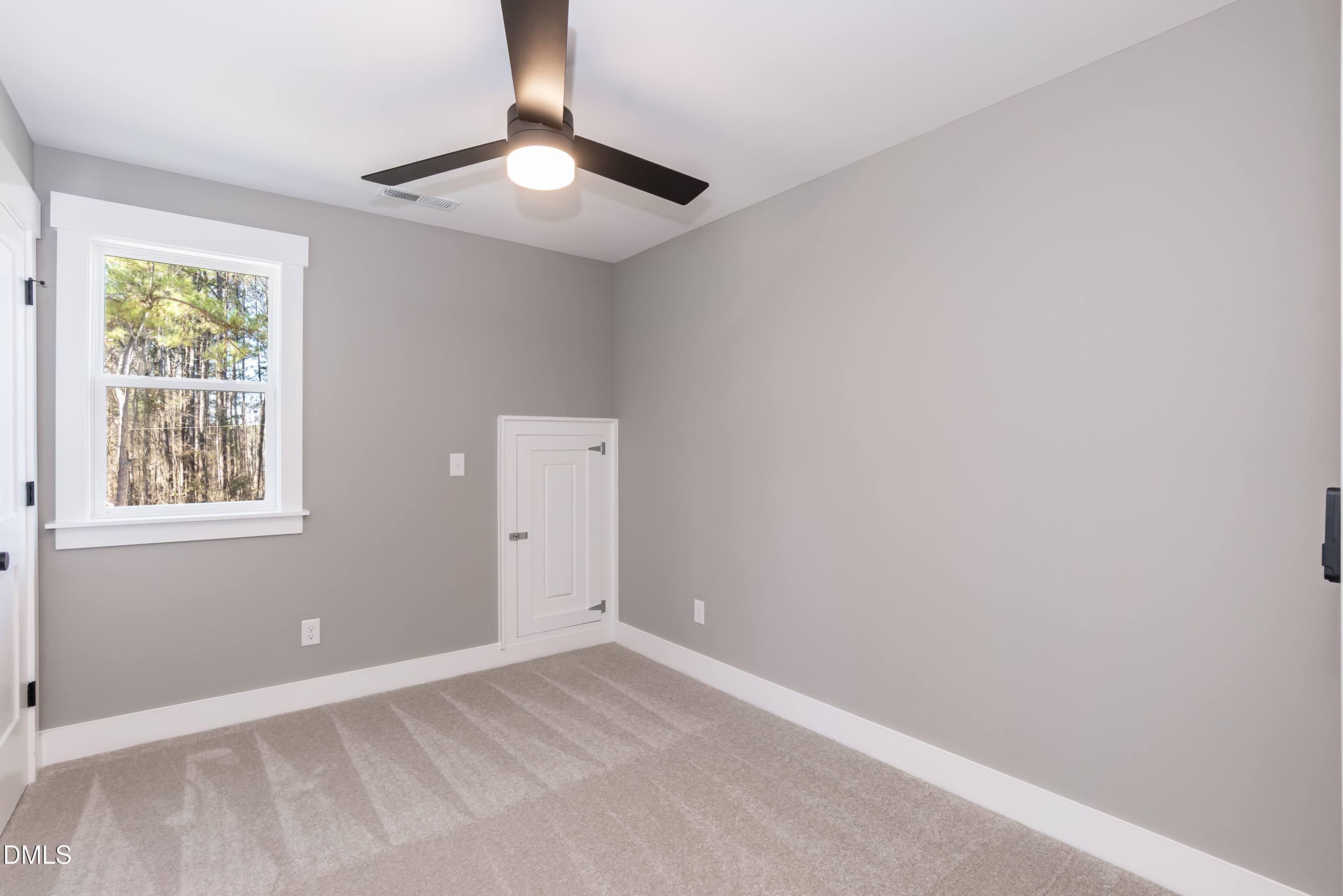 104 Buffalo Drive Spring Hope, NC 27882 - Photo 33 of 48 a view of an empty room with a window