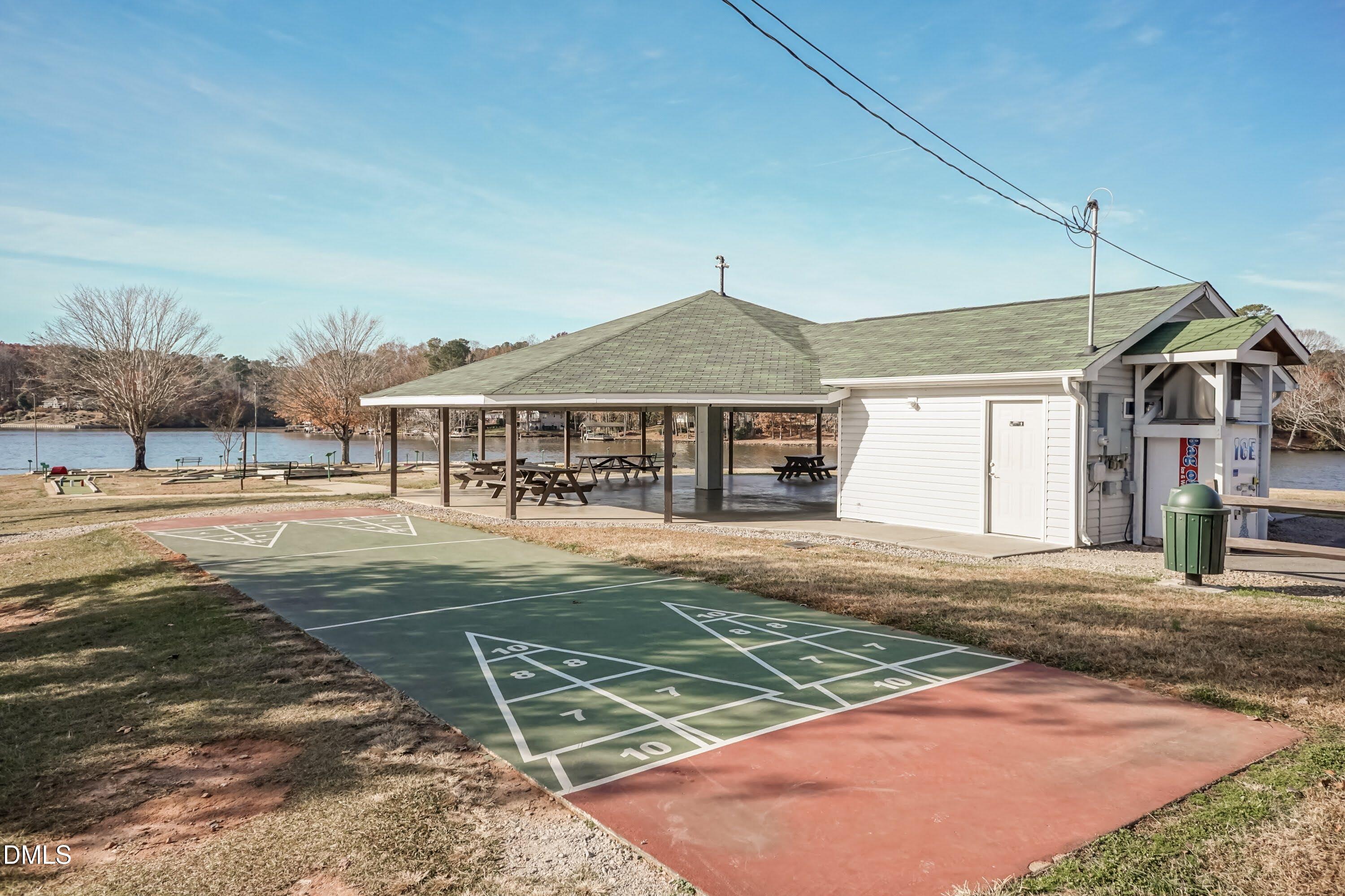 104 Buffalo Drive Spring Hope, NC 27882 - Photo 47 of 48 a view of a house with a yard and large tree
