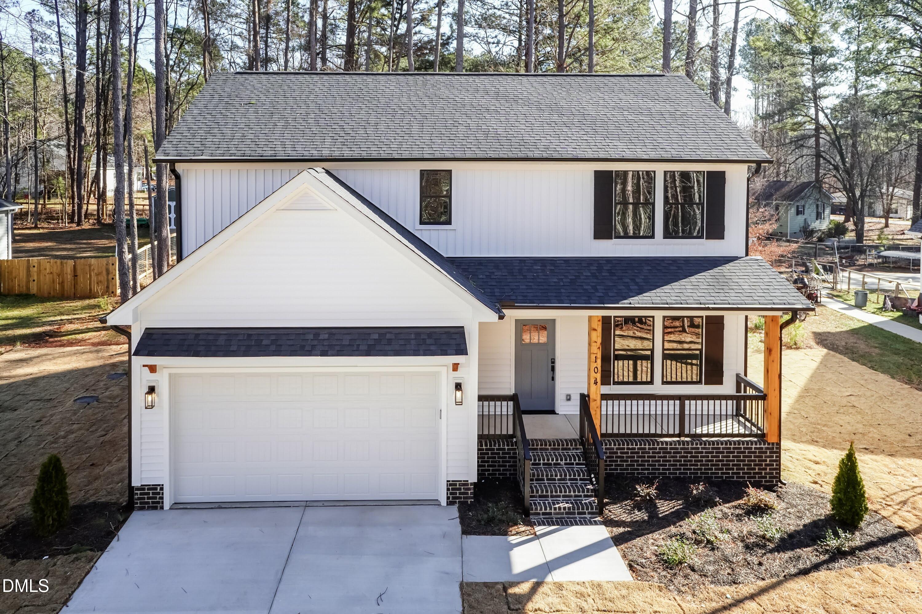 104 Buffalo Drive Spring Hope, NC 27882 - Photo 5 of 48 a aerial view of a house with a garage