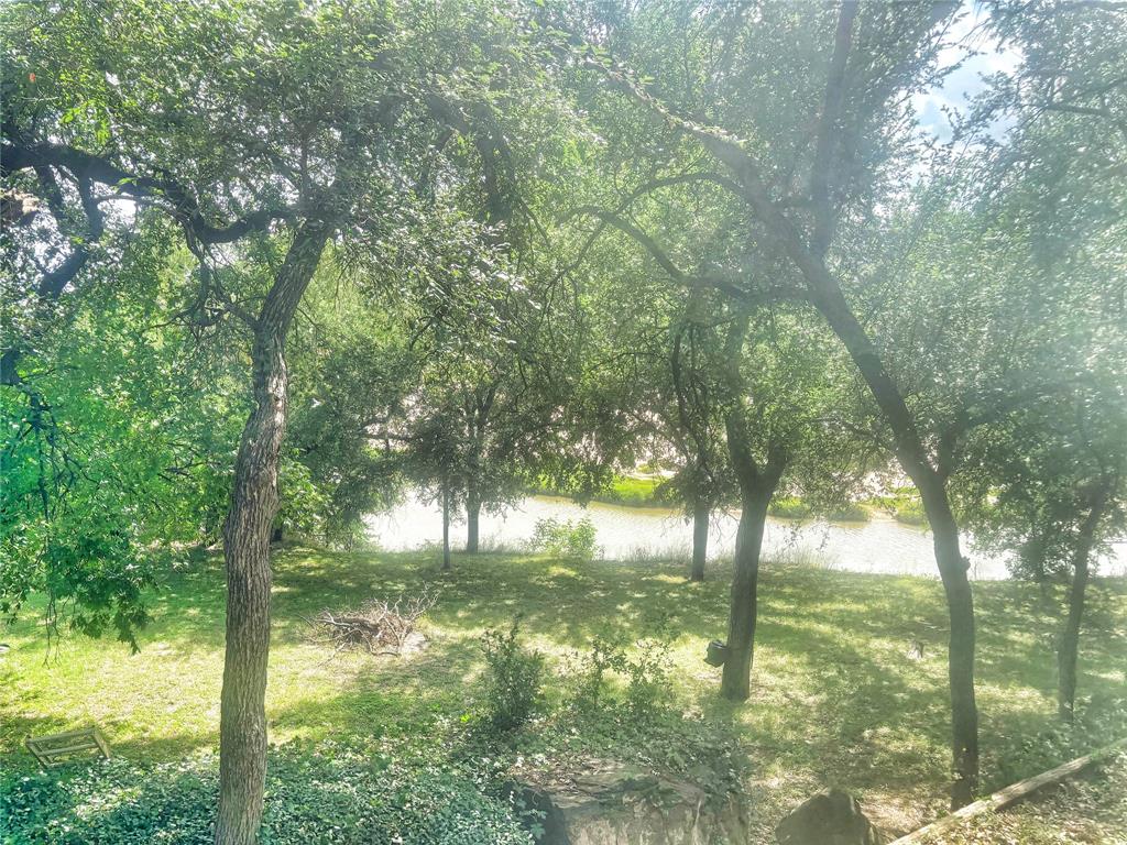 101 Riverview Road Millsap, TX 76066 - Photo 1 of 26 a view of yard from a balcony