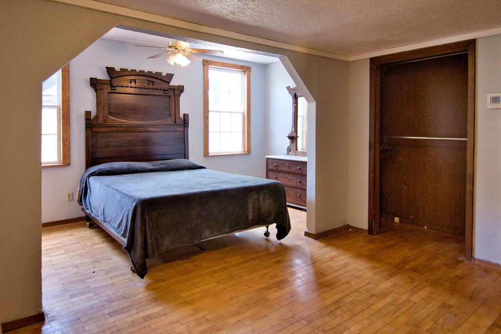 117 Robin Avenue Mason, TX 76856 - Photo 15 of 22 a bedroom with a bed and a closet