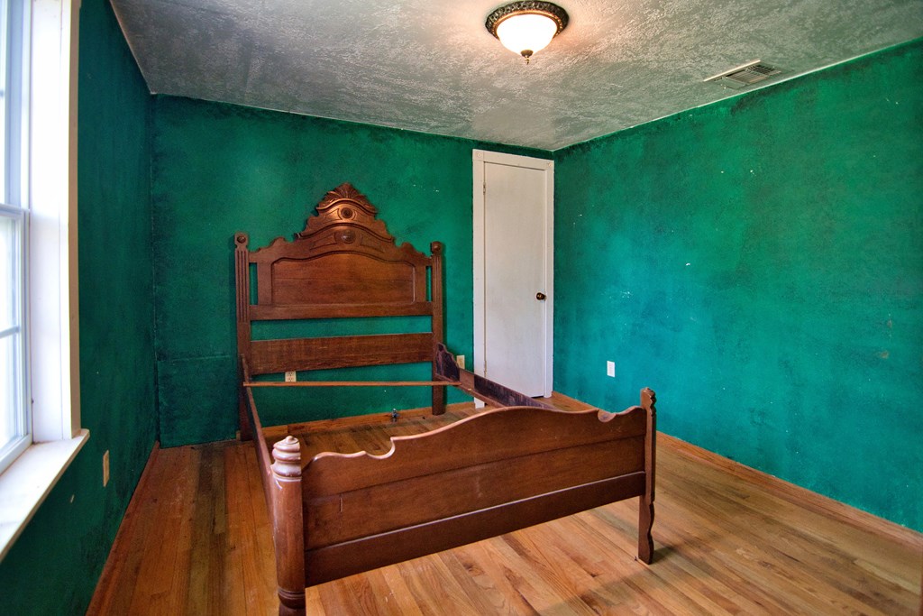 117 Robin Avenue Mason, TX 76856 - Photo 22 of 22 a room with pool table and a chandelier