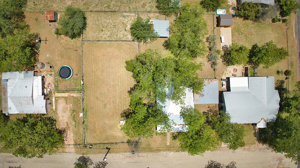117 Robin Avenue Mason, TX 76856 - Photo 7 of 22 an aerial view of a house with a yard basket ball court and outdoor seating