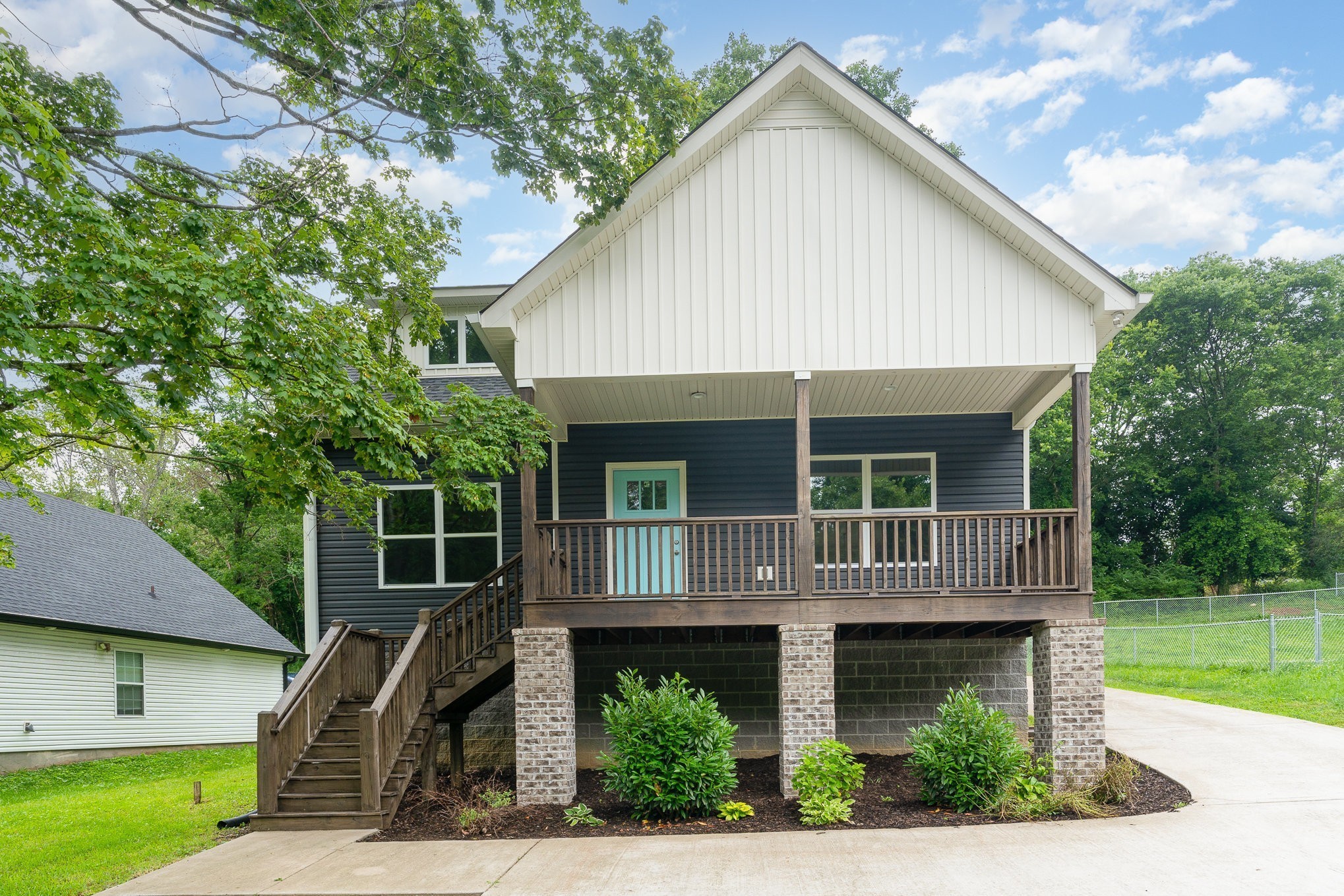 1120 Taylortown Road White Bluff, TN 37187 - Photo 1 of 24 a front view of a house with garden