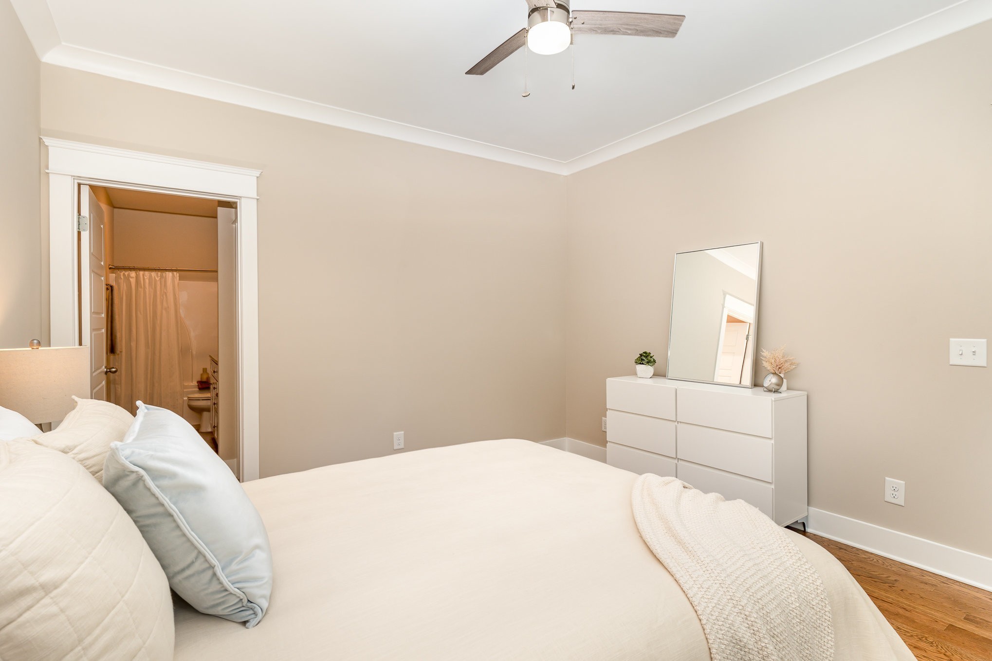 1120 Taylortown Road White Bluff, TN 37187 - Photo 15 of 24 a bedroom with a bed and a chandelier