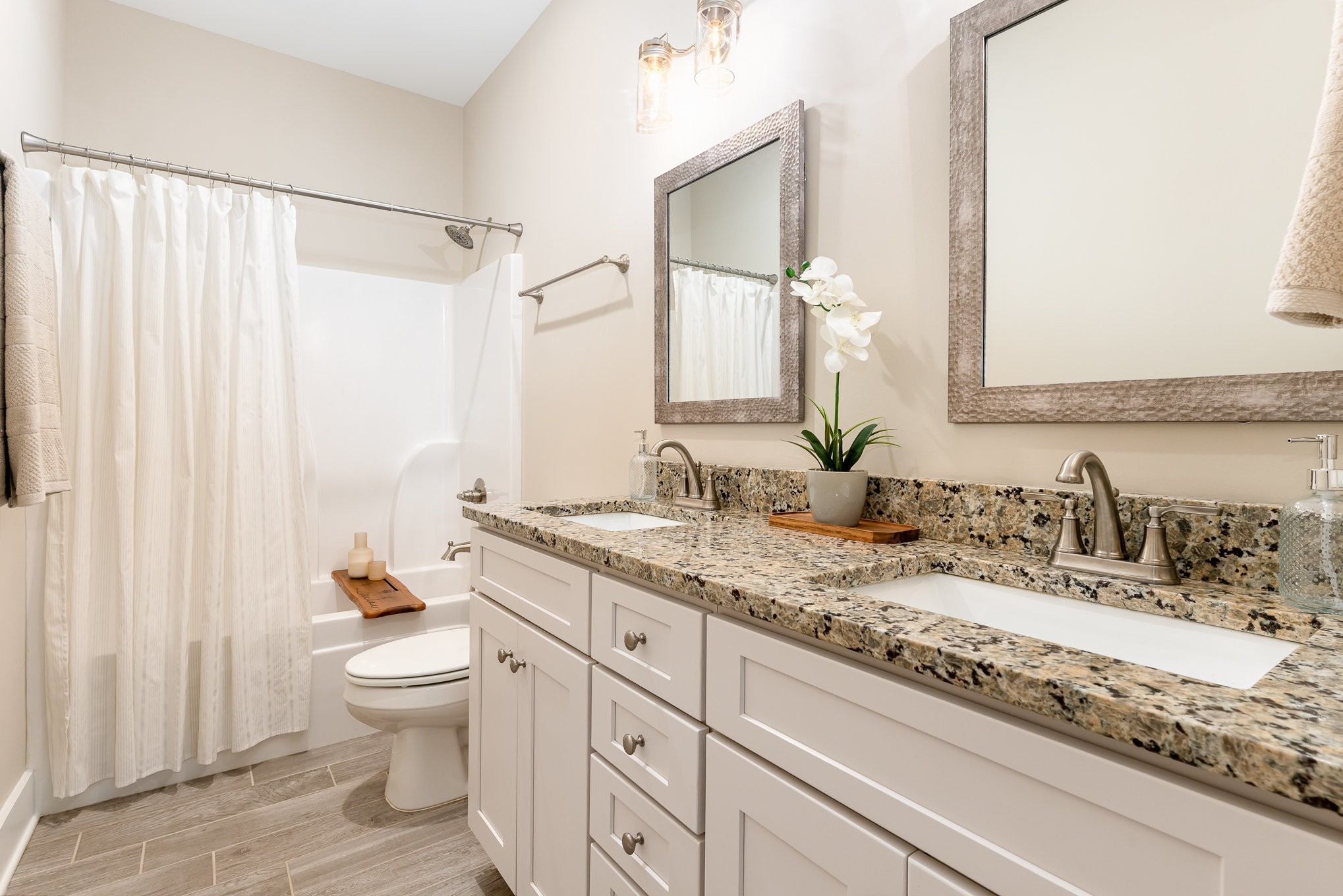 1120 Taylortown Road White Bluff, TN 37187 - Photo 17 of 24 a bathroom with a granite countertop sink and a mirror