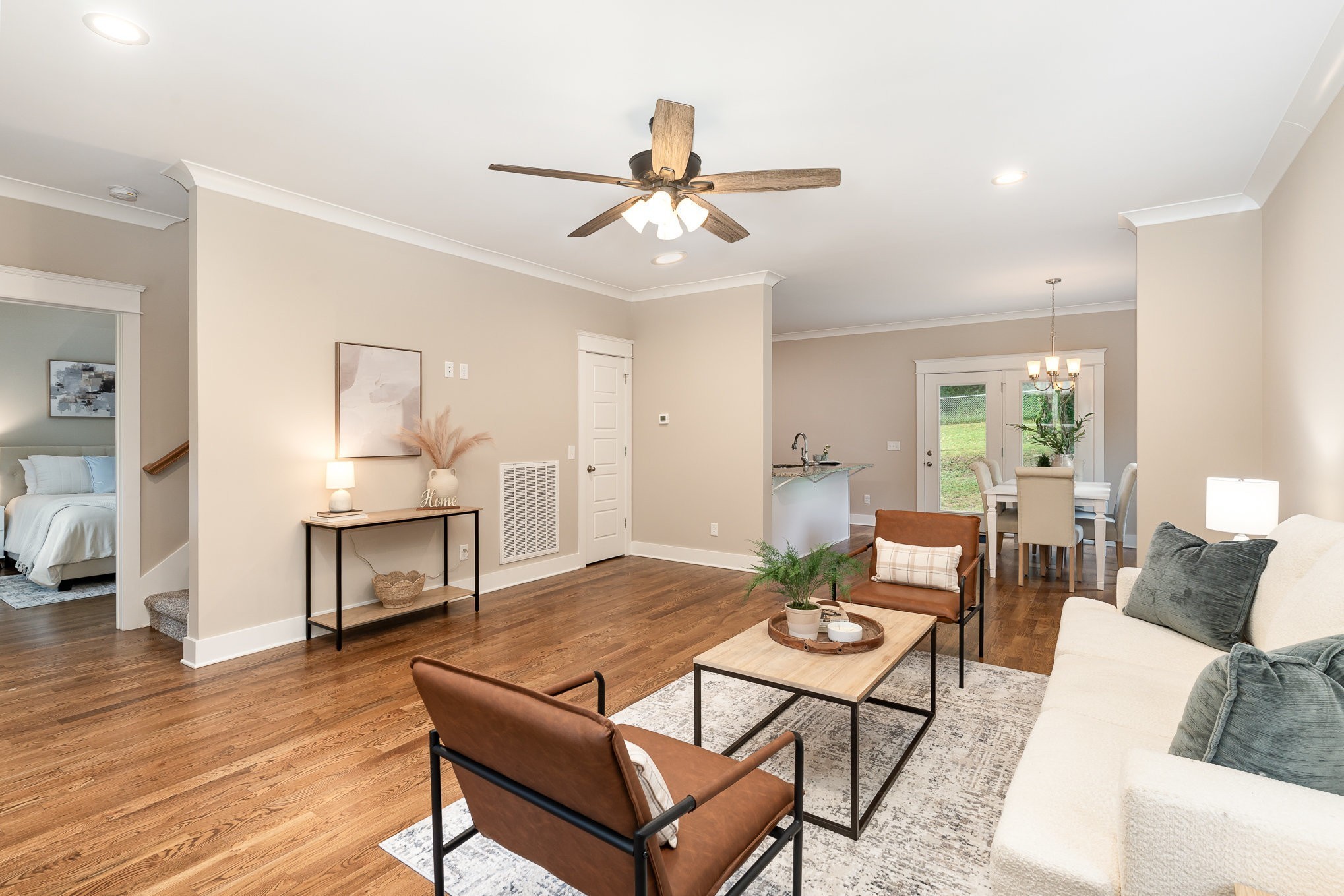 1120 Taylortown Road White Bluff, TN 37187 - Photo 7 of 24 a living room with furniture a dining table and a fireplace