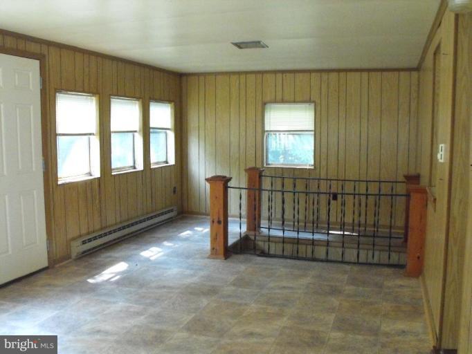 116 Paw Paw Road North Bloomery, WV 26817 - Photo 7 of 16 an empty room with windows
