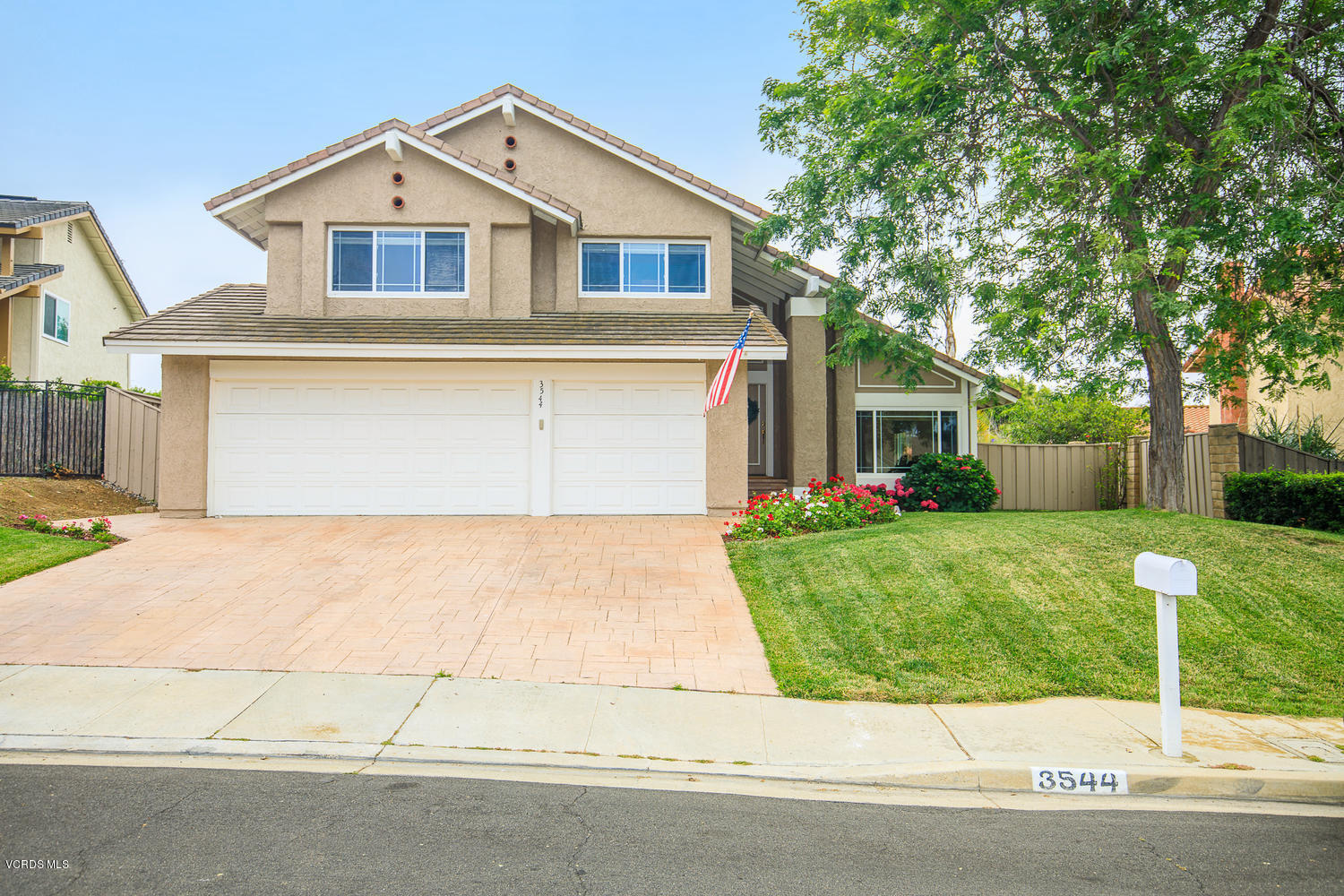 3544 Radcliffe Road Thousand Oaks, CA 91360 - Photo 1 of 27 front view of a house with a yard