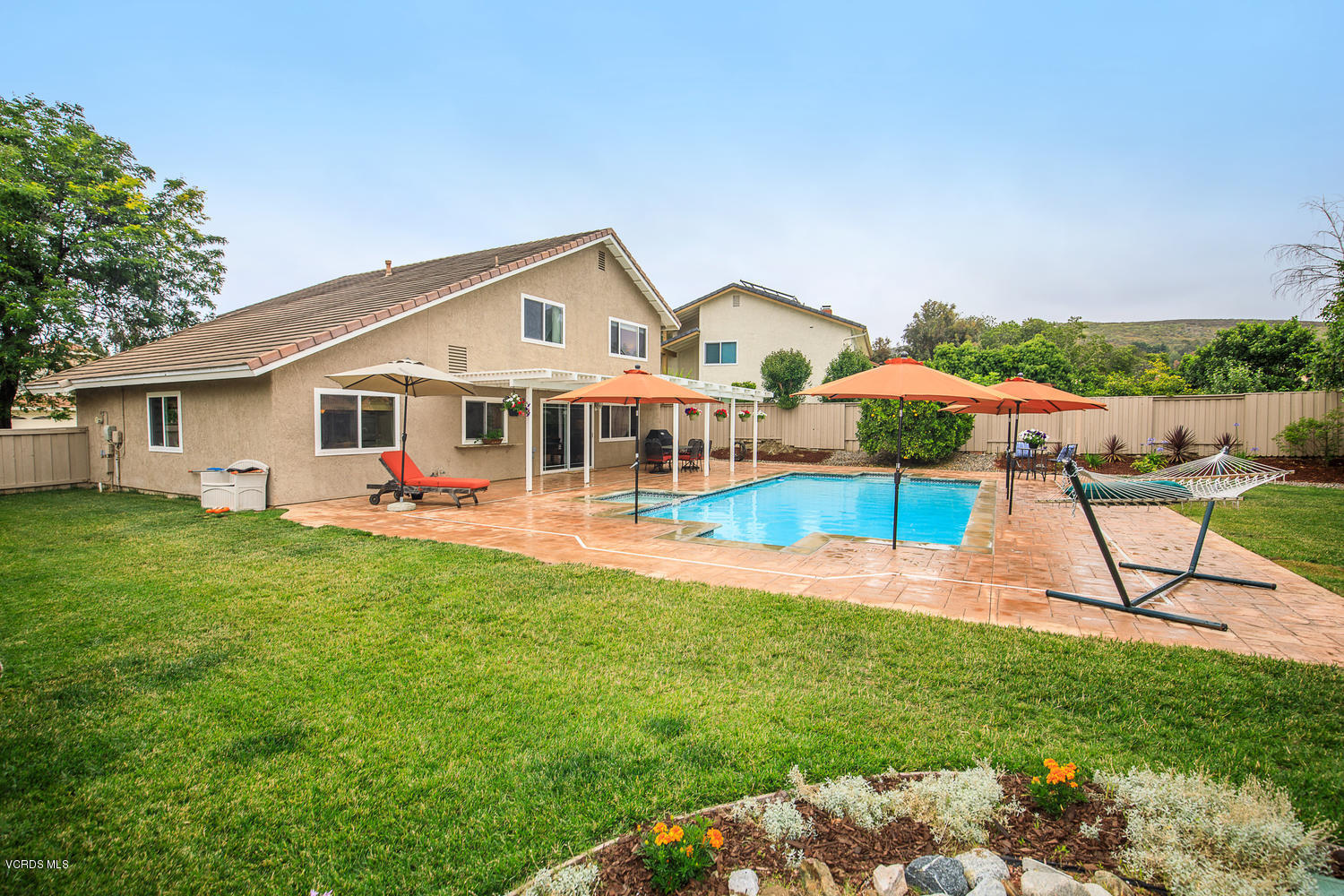 3544 Radcliffe Road Thousand Oaks, CA 91360 - Photo 16 of 27 a view of a house with a yard and sitting area