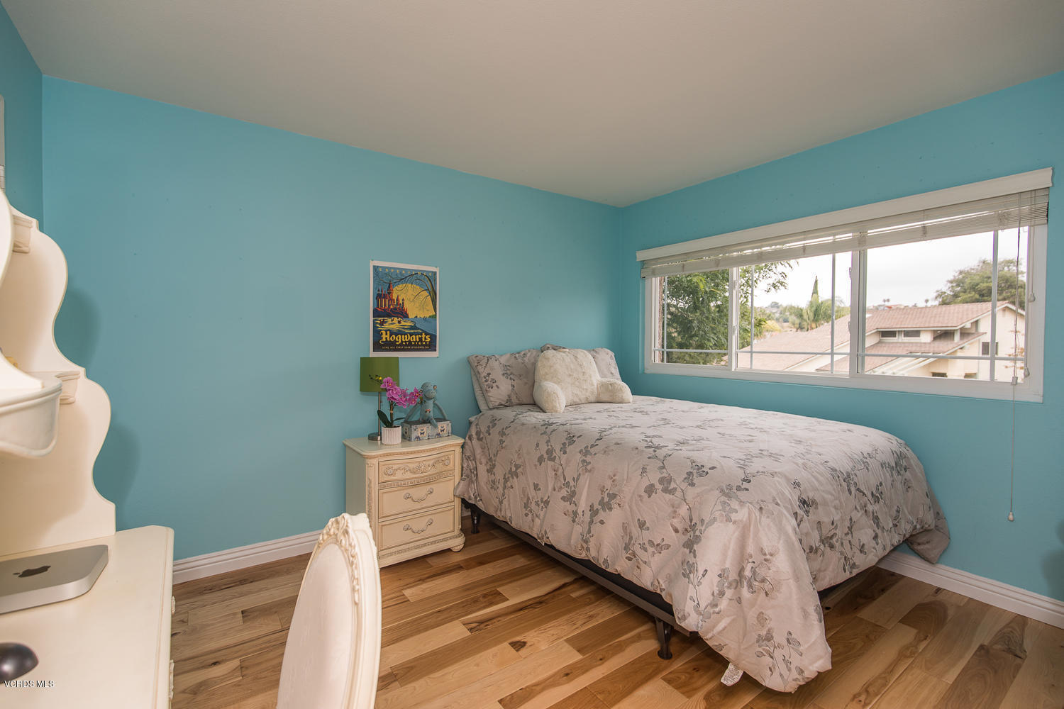 3544 Radcliffe Road Thousand Oaks, CA 91360 - Photo 20 of 27 a bedroom with a bed and wooden floor