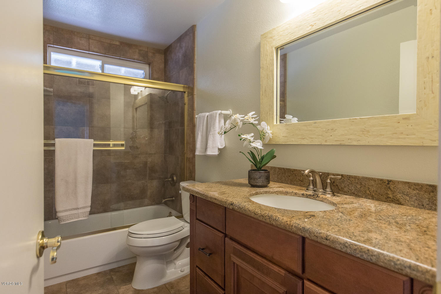 3544 Radcliffe Road Thousand Oaks, CA 91360 - Photo 21 of 27 a bathroom with a granite countertop sink toilet and shower