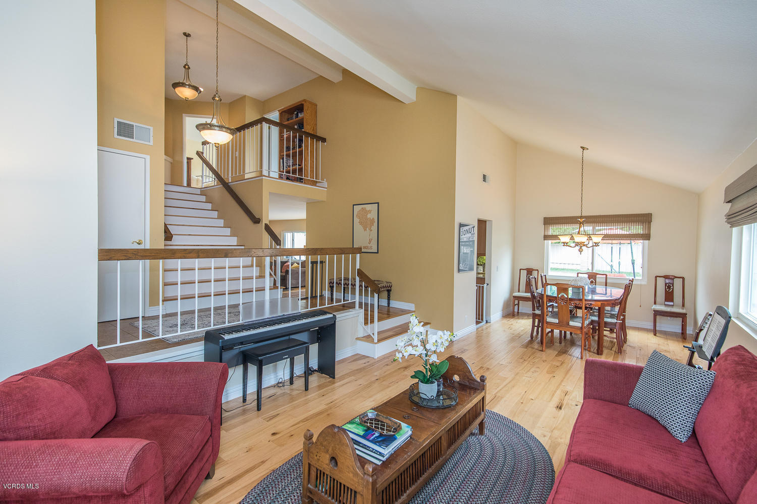 3544 Radcliffe Road Thousand Oaks, CA 91360 - Photo 9 of 27 a living room with furniture stairs and a view of kitchen
