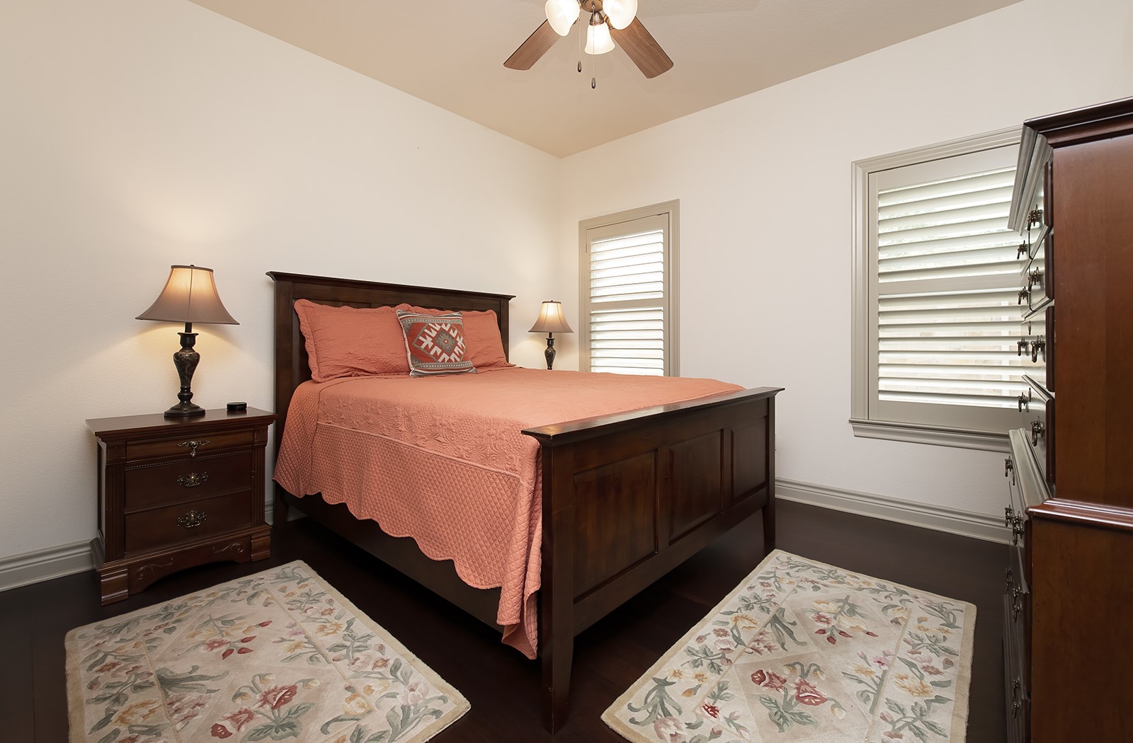 213 Acker Road Georgetown, TX 78633 - Photo 23 of 32 a bedroom with a bed and a dresser