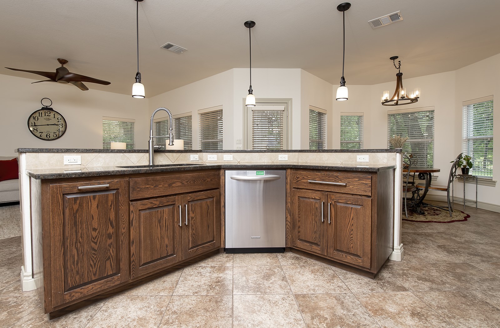 213 Acker Road Georgetown, TX 78633 - Photo 9 of 32 a kitchen with a sink and cabinets
