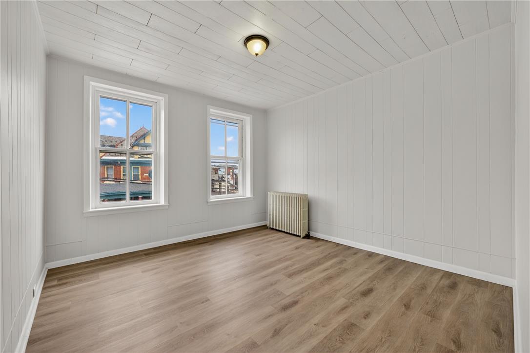 65 2nd Street Slatington, PA 18080 - Photo 28 of 46 This naturally illuminated bedroom offers versatile design possibilities with durable flooring and crisp white paneling.