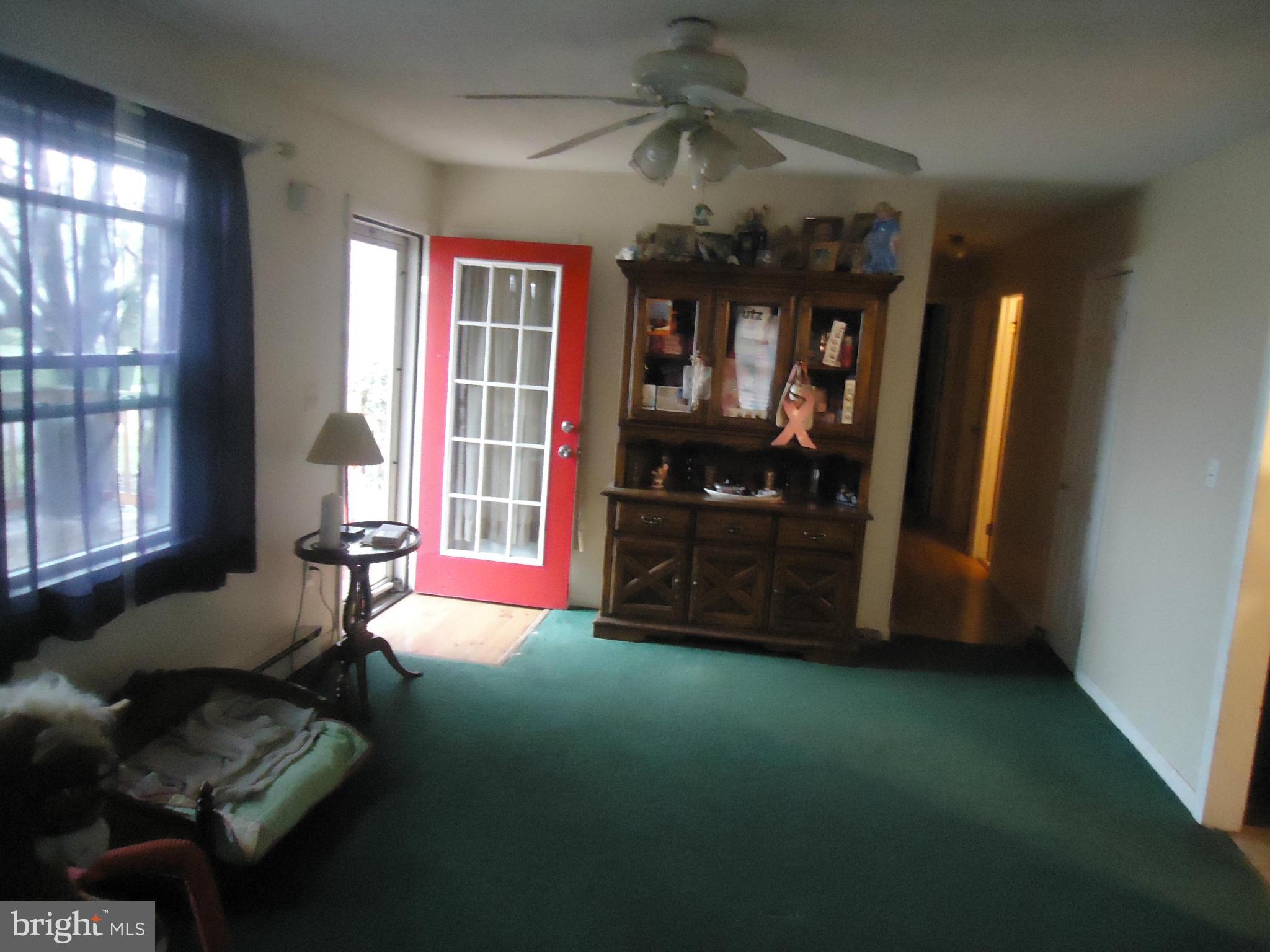 161 Orchard Drive Ranson, WV 25438 - Photo 4 of 9 a living room with furniture and a flat screen tv