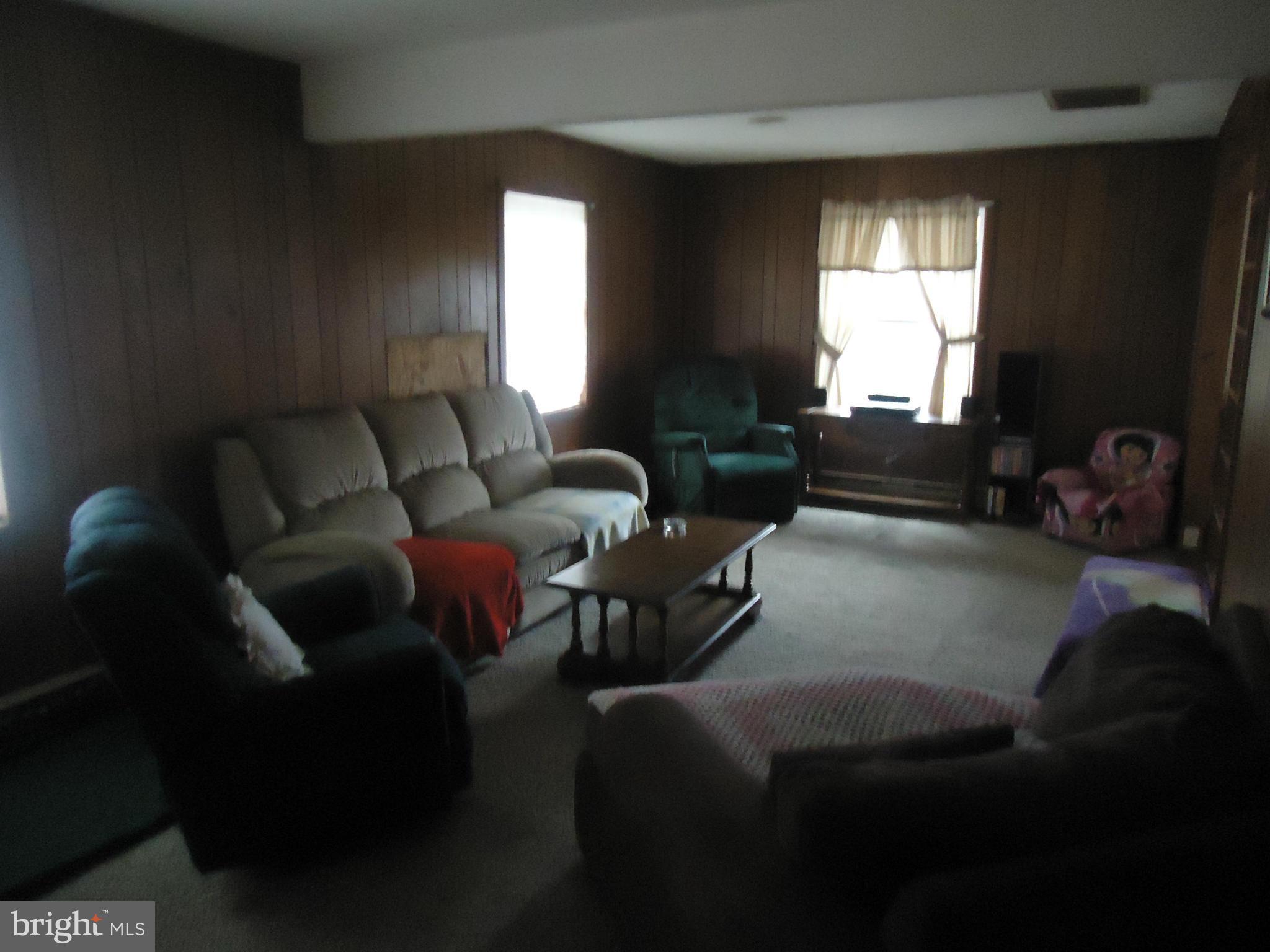 161 Orchard Drive Ranson, WV 25438 - Photo 5 of 9 a living room with furniture and a window
