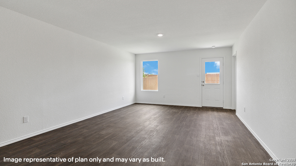 12707 Burro Canyon Converse, TX 78109 - Photo 16 of 72 an empty room with wooden floor and window
