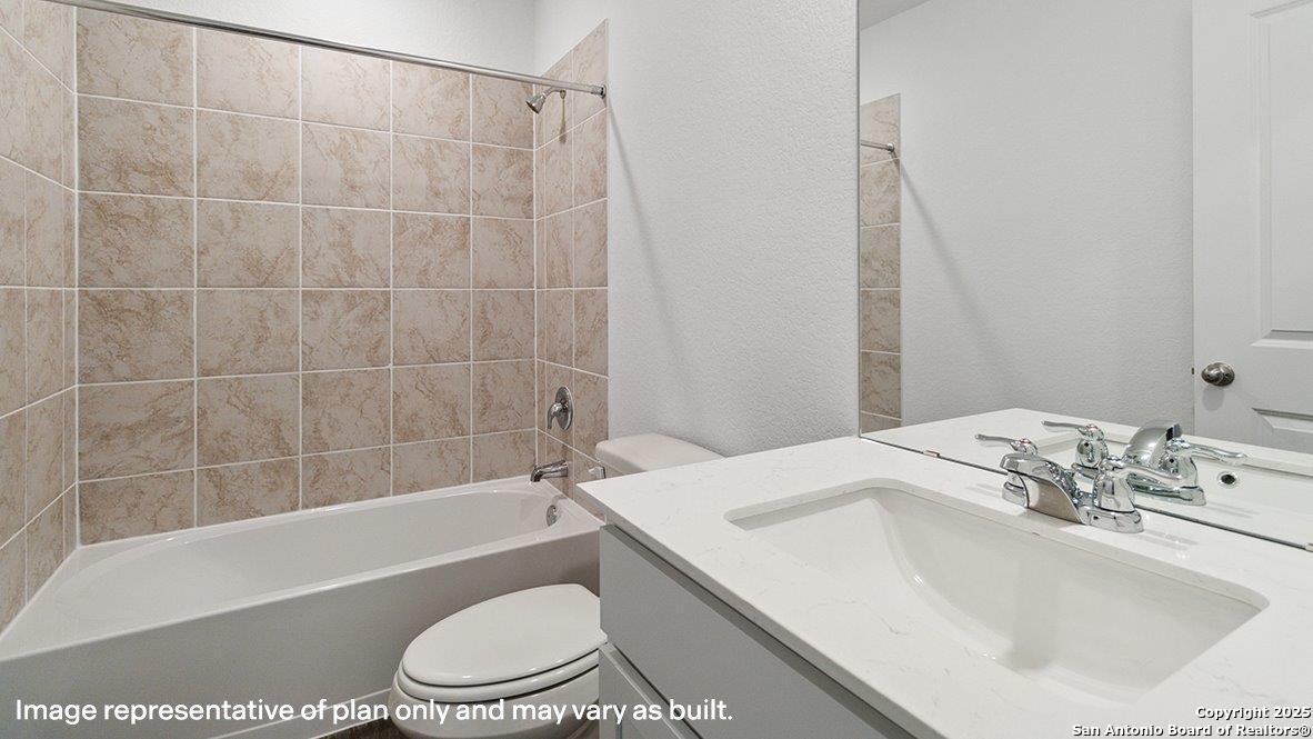 12707 Burro Canyon Converse, TX 78109 - Photo 29 of 72 a bathroom with a sink toilet and shower