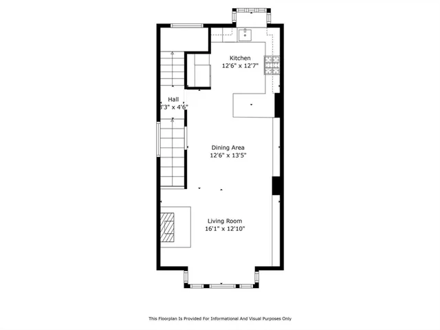 a picture of a bench in front of a wall