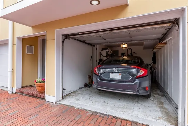 a front view of a house with entryway and wooden floor