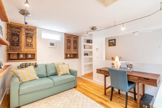 a living room with furniture and a couch