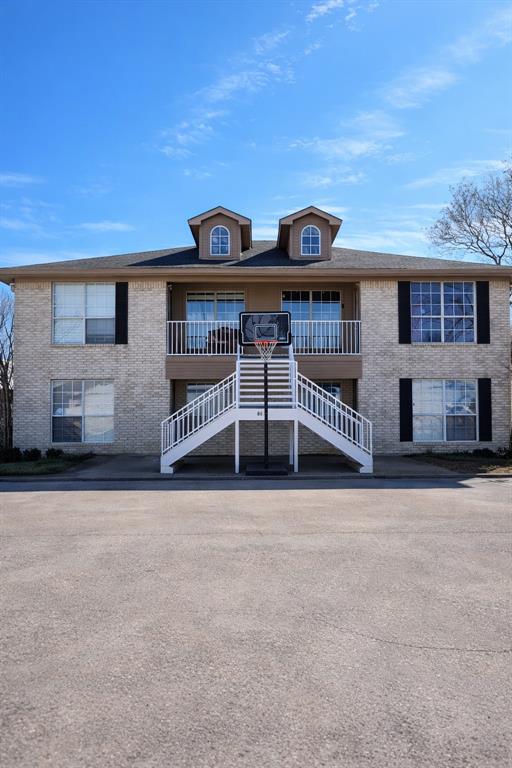 a front view of a house with balcony