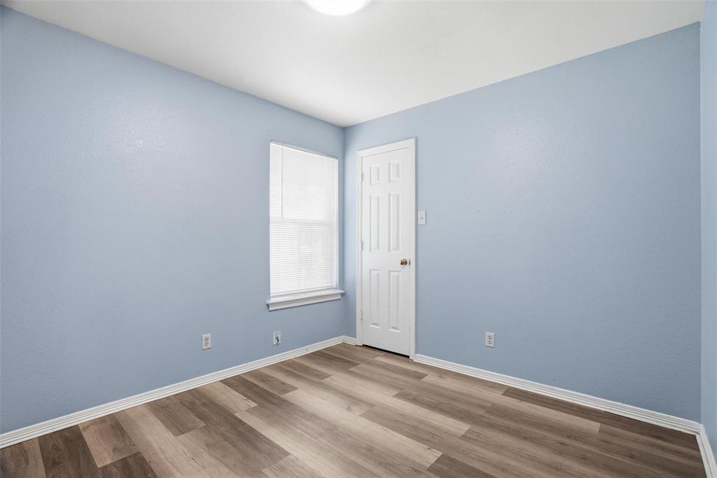 609 Race Street Crowley, TX 76036 - Photo 13 of 18 a view of an empty room and window