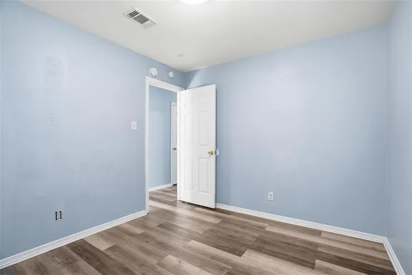a view of a room that has a window in it