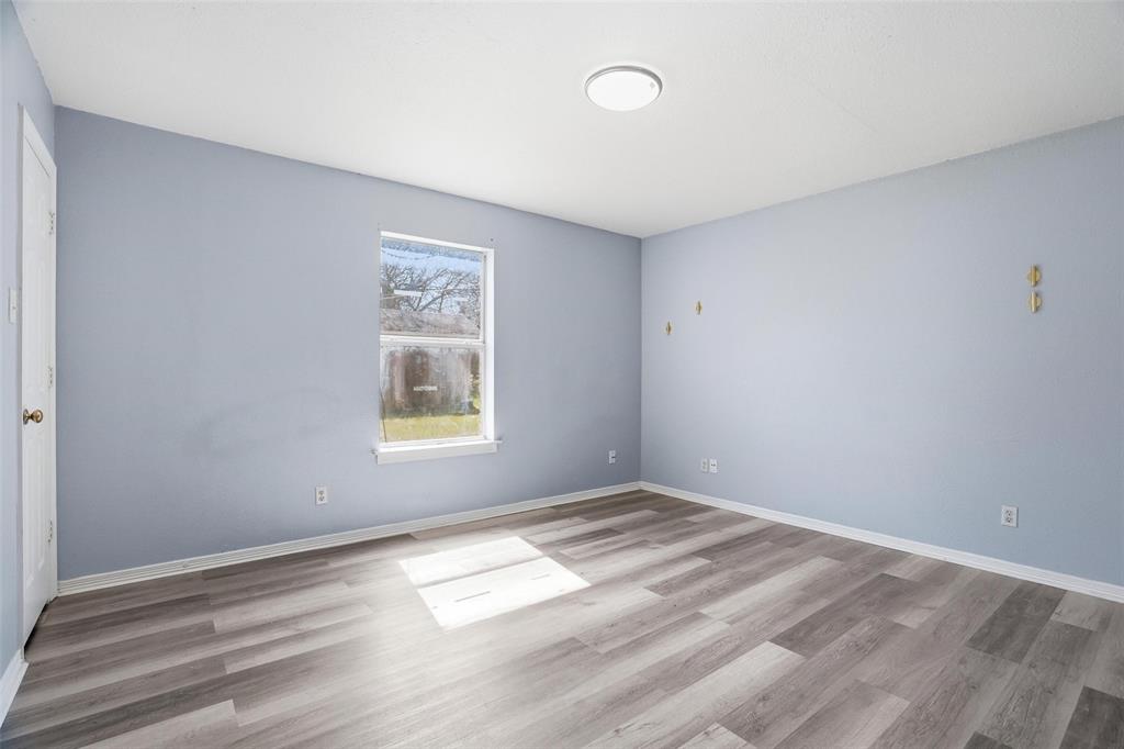 609 Race Street Crowley, TX 76036 - Photo 15 of 18 a view of a room that has a window in it