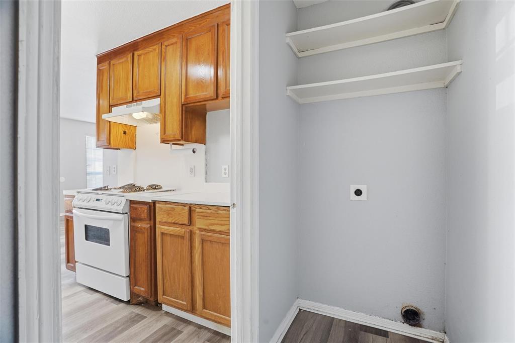 609 Race Street Crowley, TX 76036 - Photo 8 of 18 a bathroom with a sink and a mirror