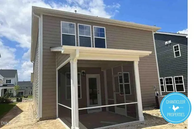 a front view of a house with glass windows