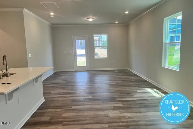 a view of kitchen and windows