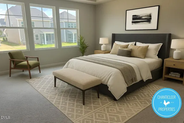 a bedroom with a bed and a chair