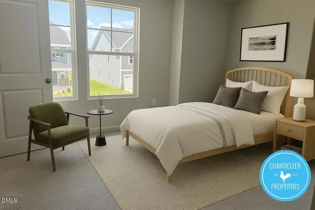 a bedroom with a bed and a couch