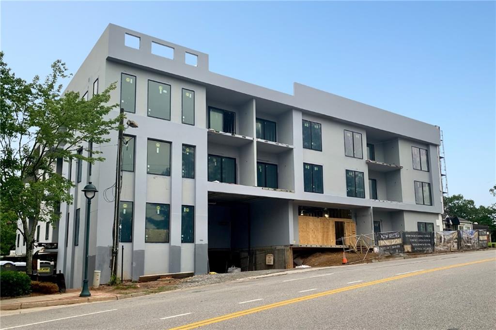 318 Sandy Springs Circle, Unit 260 Sandy Springs, GA 30328 - Photo 13 of 30 a view of a building with a street