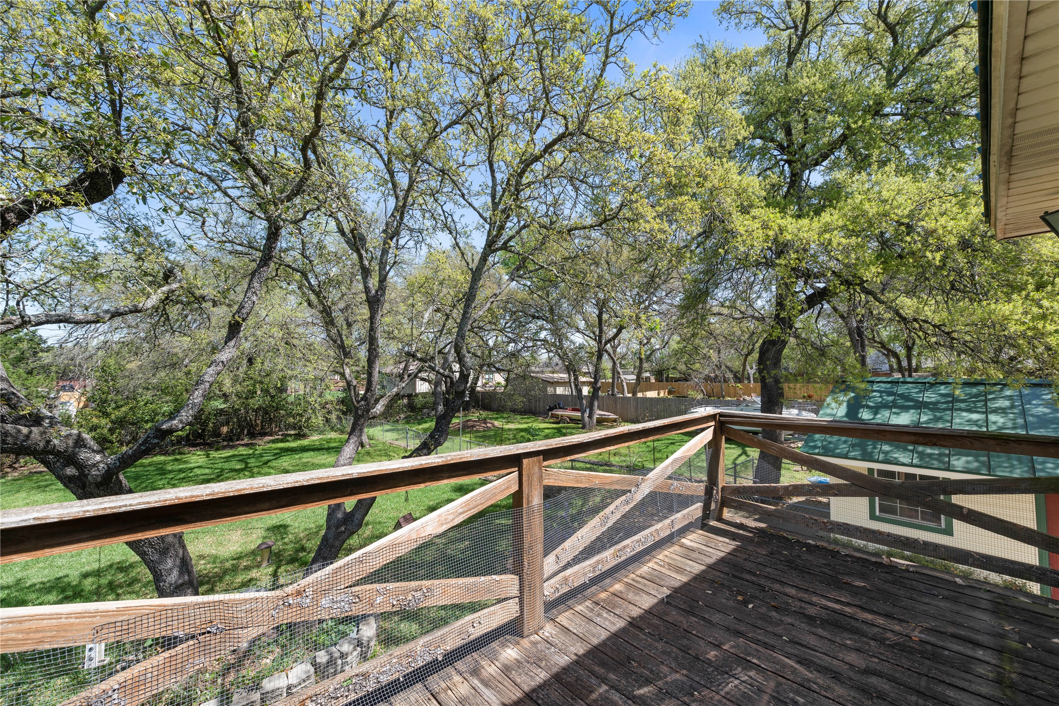 986 Benchmark Trail Belton, TX 76513 - Photo 20 of 31 a view of a balcony with wooden floor and fence
