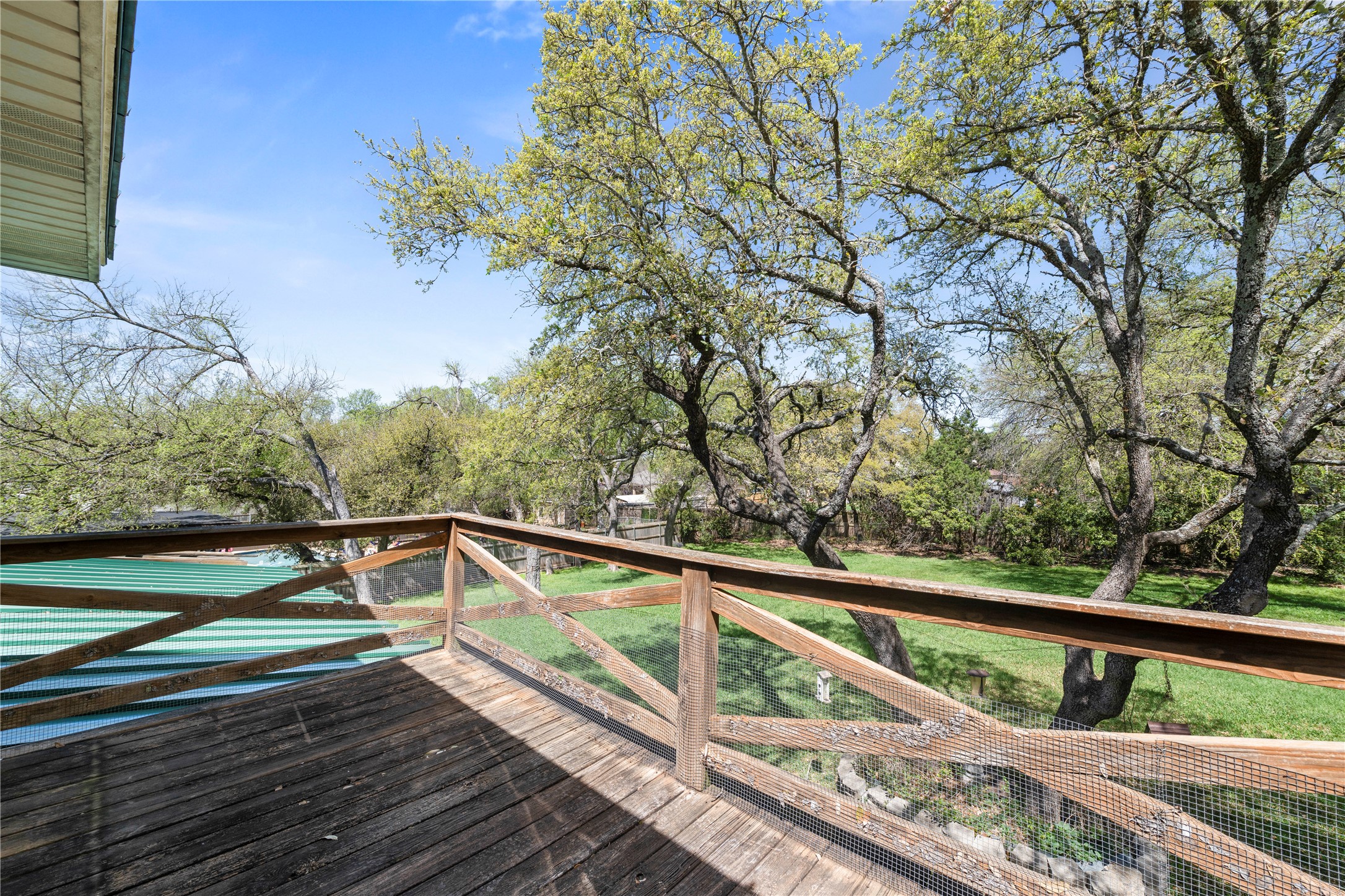 986 Benchmark Trail Belton, TX 76513 - Photo 21 of 31 a view of balcony with wooden floor and fence