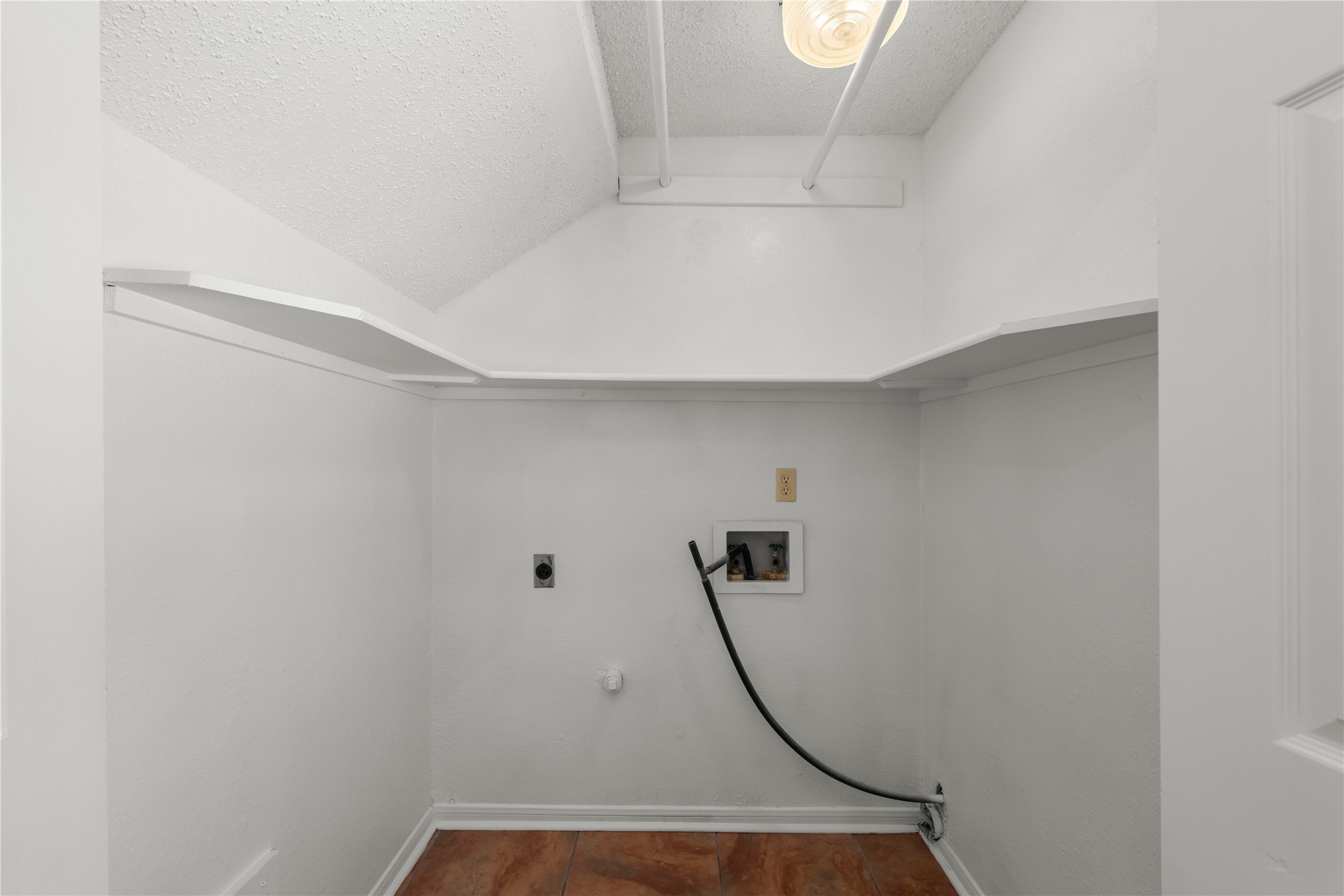 986 Benchmark Trail Belton, TX 76513 - Photo 25 of 31 a room with water heater and a shower