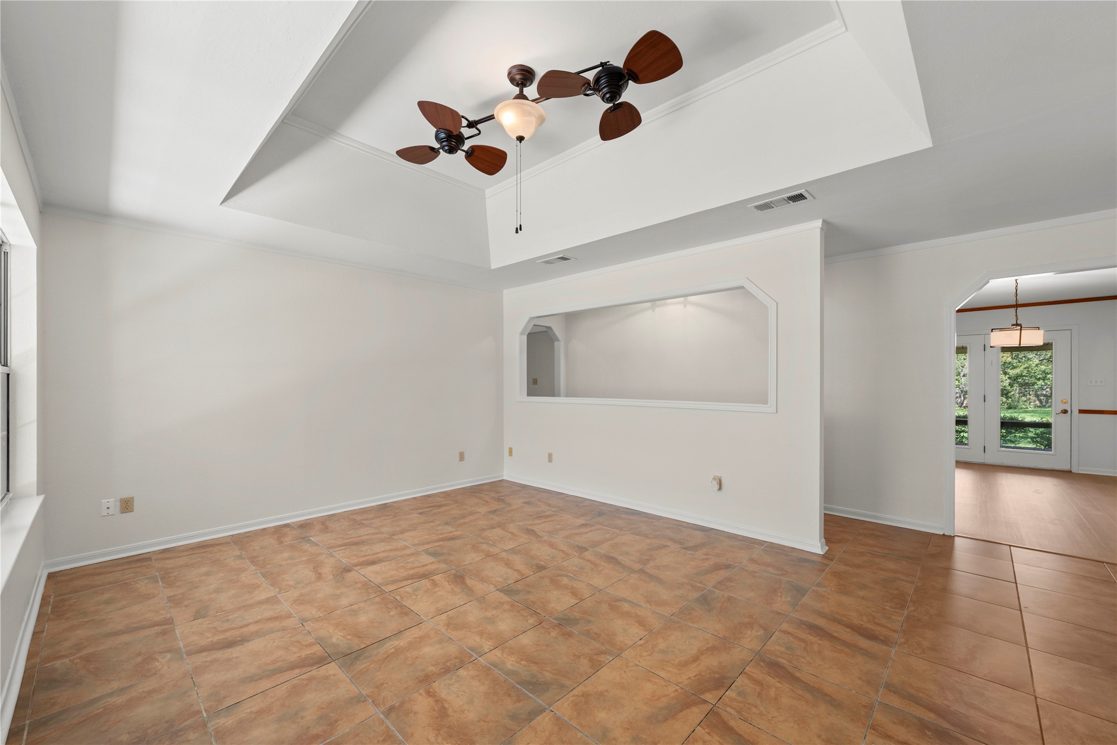 986 Benchmark Trail Belton, TX 76513 - Photo 5 of 31 an empty room with fan and windows