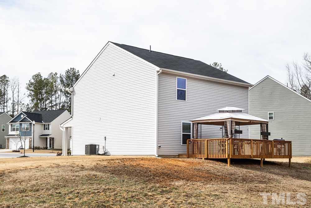 201 Rustling Way Zebulon, NC 27597 - Photo 24 of 30 a front view of a house with a yard