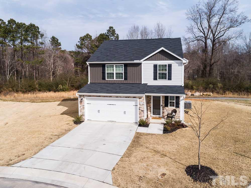 201 Rustling Way Zebulon, NC 27597 - Photo 27 of 30 a view of house with yard in front of it