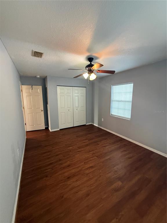 202 Owens Road Lake Wales, FL 33859 - Photo 15 of 17 wooden floor in an empty room with a window