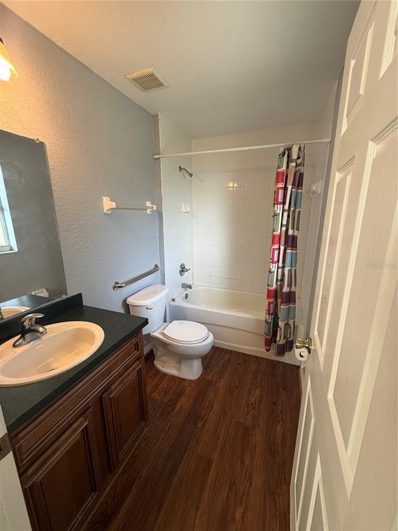 202 Owens Road Lake Wales, FL 33859 - Photo 10 of 17 a bathroom with a double vanity sink and a mirror
